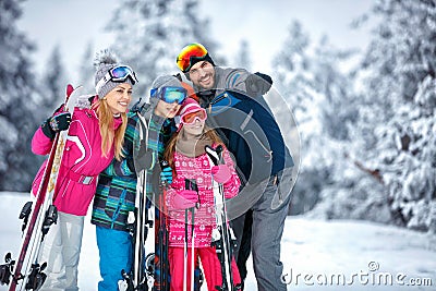 Skiing, winter, snow, sun and fun - family enjoying holiday vacations Stock Photo